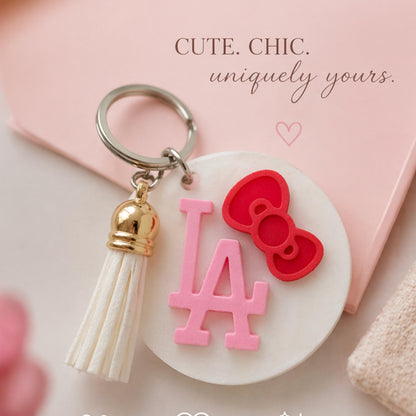 Pink LA Keychain with Bow | Dodgers Inspired Baseball Charm | Tassel Bag Accessory